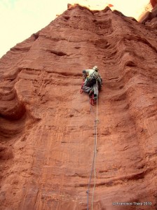 On the first pitch's bolt ladder. In the desert, just because they're bolts, does not mean they're secure! My first aid pitch.